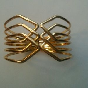 Gold bracelet with detailing lines